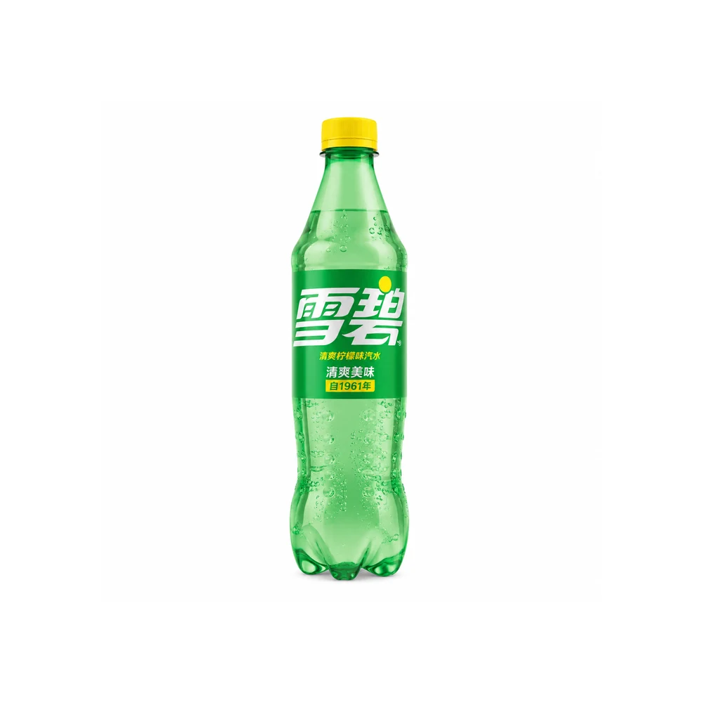 A green plastic bottle of雪碧 (Sprite) soft drink with a yellow cap, shown on a plain white background.
