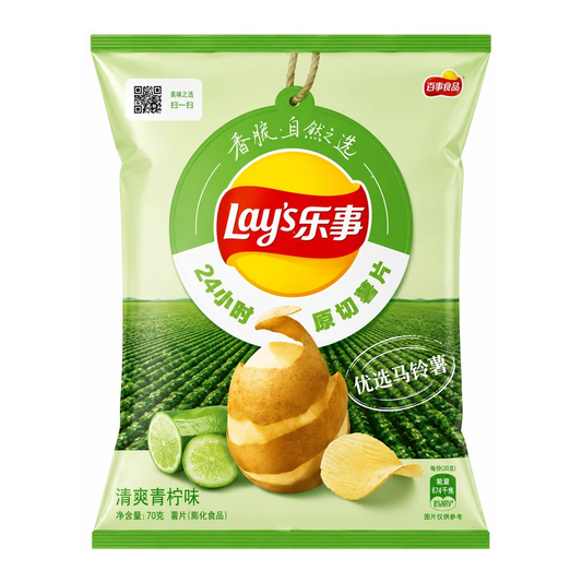 A bag of Lay's potato chips in a light green clamshell package with a large green circular logo, a red Lay's brand tab, and an illustration of a peeled potato and green cucumber slices on a white background.