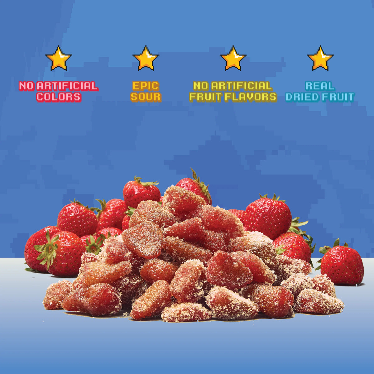 Gummy strawberries with text claiming no artificial colors, epic sour, no artificial fruit flavors, and real dried fruit on a blue background.